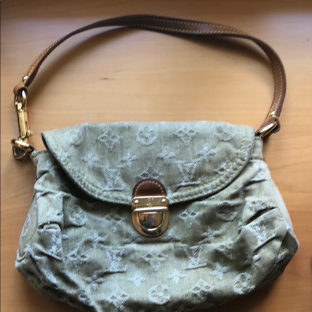 Louis Vuitton clutch in olive denim